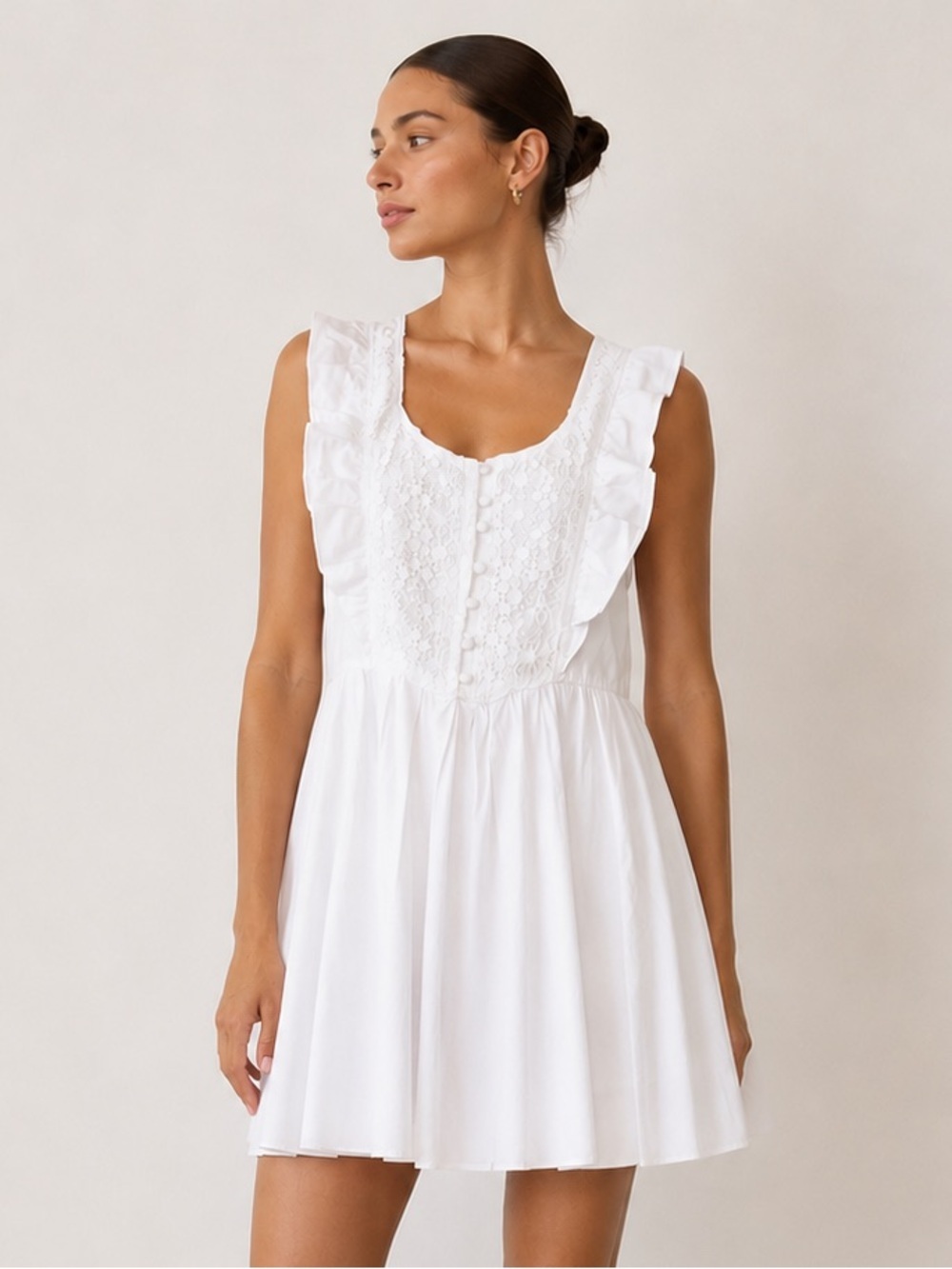 Free People “half moon”white mini dress with floral lace inset & ruffles.Size XS